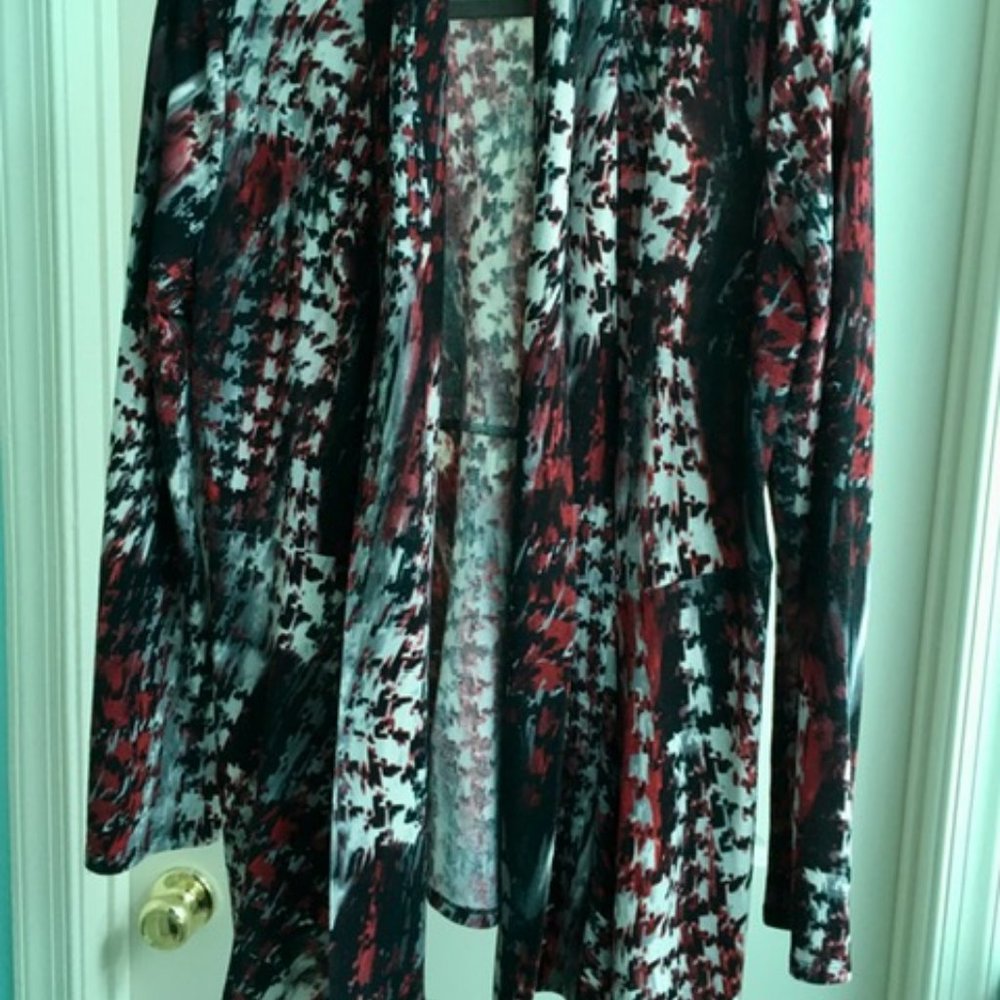 A Nipon Boutique shawkl neck, super comfortable sweater